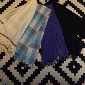 4 scarves, 1 spring(white one), 3 winter